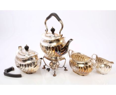 Late Victorian silver four piece tea set comprising teapot of half fluted form, with angular ebony handle (now detached), dom