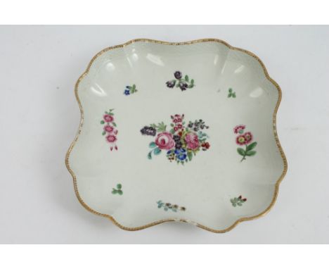 Mid-18th century Worcester porcelain dessert dish of waisted square form, with basket-weave moulded border and polychrome pai