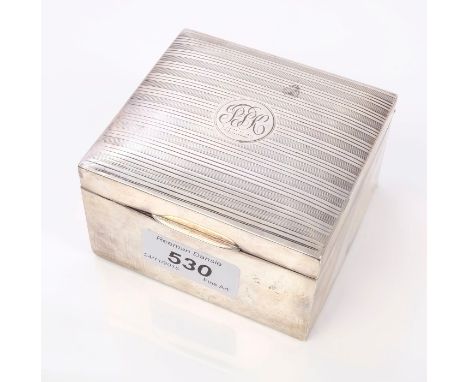 George V silver cigarette box of square form, domed hinged cover with engine-turned decoration, engraved initials and cedar l