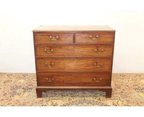 George III mahogany chest of two short and three long graduated drawer with brass swan-neck handles and cock-beaded edge, on 
