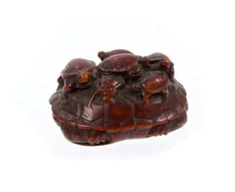 Late 19th century Japanese carved hardwood netsuke, finely carved as a family of baby terrapins clustered on their mother's s