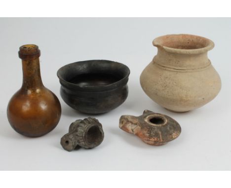 Group of ancient pottery including Roman crusie lamp, two pots, early bottle - probably 17th / 18th century and pipe bowl (5)