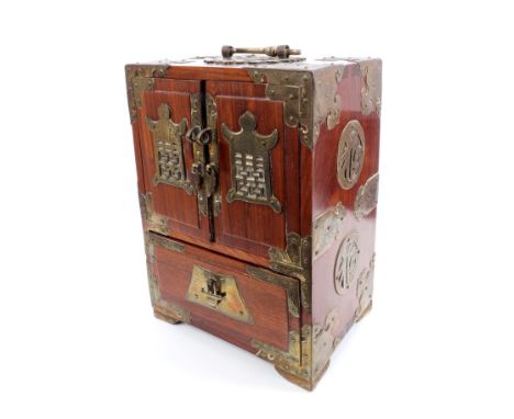 19th century Chinese padouk and tooled brass mounted miniature cabinet of box form, on bracket feet, with surmounting carryin