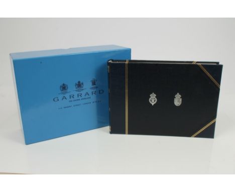 TRH The Prince and Princess of Wales - Presentation visitors book / album with twin silver embossed Prince and Princess of Wa