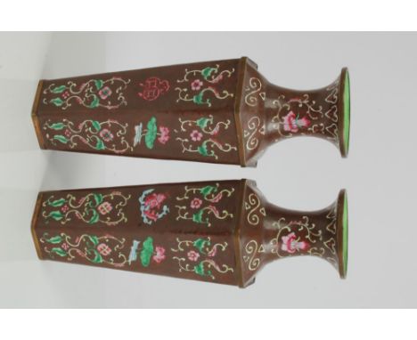 Pair of Chinese Canton enamel vases of hexagonal form, with stepped shoulder, high neck and everted rim, decorated with the f