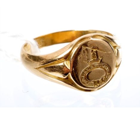 Antique yellow metal signet ring with intaglio crest.  Ring size K CONDITION REPORT 5.1 grams