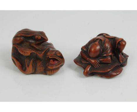 Late 19th century Japanese carved hardwood netsuke, carved as a frog and a snake entwined around a lotus - two character mark