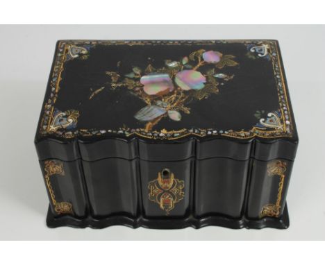 Victorian black papier mâché, abalone inlaid and gilt heightened tea caddy of rectangular box form, with wavy shaped front de