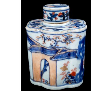 18th century Chinese Imari hexafoil form tea caddy and cover decorated with a continuous frieze of a garden with sculptural r