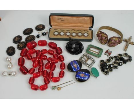 Edwardian leather jewellery box containing a collection of antique and vintage jewellery, to include set enamel buttons, enam