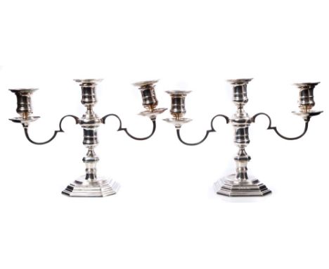 Pair fine quality contemporary silver three-light candelabra in the Queen Anne style, on stepped octagonal bases, with angula