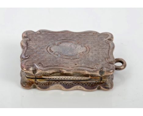 Victorian silver vinaigrette of rectangular form, with engine-turned decoration, scroll borders and suspension ring, hinged c