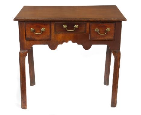 George II fruitwood lowboy with moulded rectangular top over three frieze drawers and shaped apron on caddy moulded chamfered