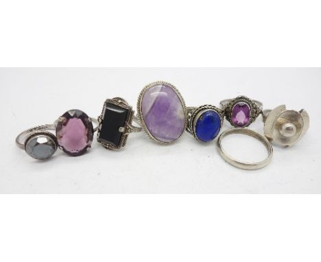 A collection of eight silver rings including Art Deco and amethyst set
