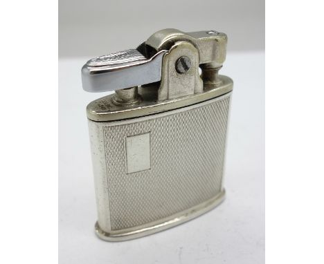 A Ronson lighter, marked sterling silver, with original box