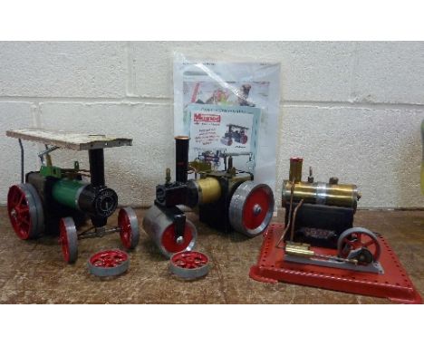 Two Mamod steam tractors and a static engine with accessories and instructions