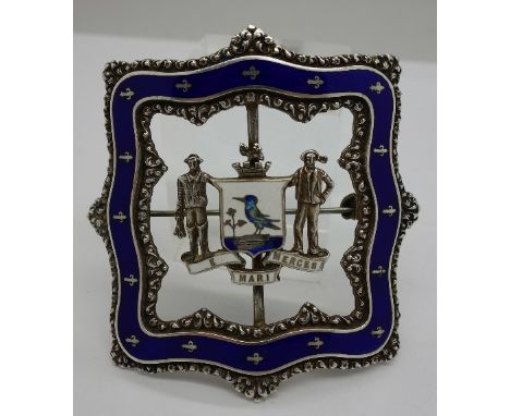 A silver and enamel buckle shaped brooch with the motto of Halifax, Nova Scotia, width 6cm