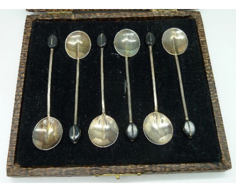 A cased set of six silver coffee bean spoons, Birmingham 1923, by Adie Brothers, weight 36g