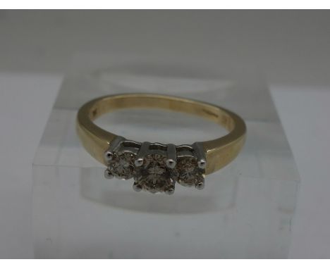 A 9ct gold and diamond ring, 0.8ct diamond weight, weight 2.9g, size K, shank a/f