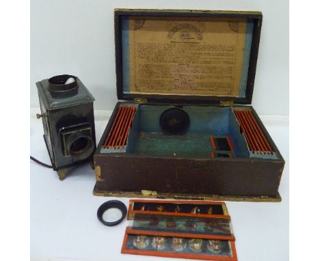 A German, Standard tinplate magic lantern by Ernst Plank with slides