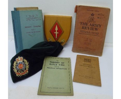 A collection of War Office issued booklets mainly Infantry Training, Theory of Rifle Fire, The Army Review, a plaque and a ca