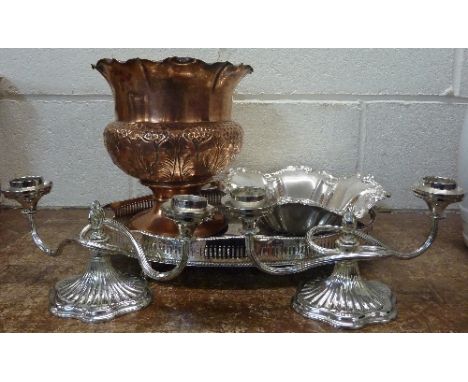 A silver plated gallery tray, a copper planter, a plated dish and two candelabra