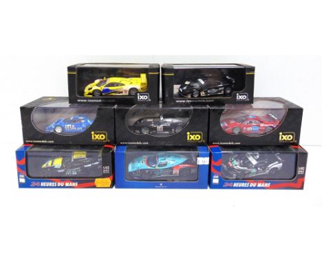 EIGHT 1/43 SCALE IXO DIECAST MODEL RACING CARS  comprising a No.MDC005, Ferrari F40, no.40 Imsa 1990; No.LMC076, Ferrari F40,