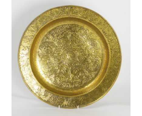 Rare Venetian brass engraved basin, 16th Century, finely engraved with Icthyocentaurs, mythological beasts and arabesques, 45