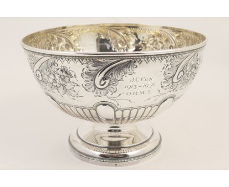 Late Victorian silver rose bowl by Walker & Hall, Sheffield 1894, chased with floral scrolls, the lower half of the bowl reed