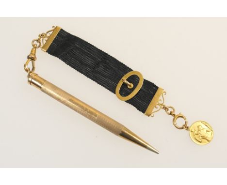 9ct gold cased propelling pencil, inscribed and dated 1954, 9.5cm, suspended from a black satin and 9ct gold mounted sash wit