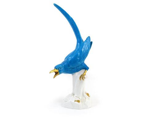 Mintons china magpie, circa 1890, after a Meissen original, the bird in bold turquoise glaze with gilded beak and claws over 