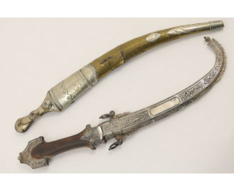 Balkan jambiya, the curved blade with a centre ridge, beaded and white metal clad hilt and scabbard, 44cm; also another jambi