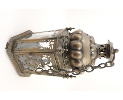Dutch pressed metal hall lantern, late 19th Century, octagonal section with pierced chimney and handle on top, with chain for