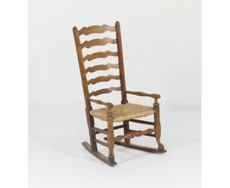 Lancashire ash and elm ladder back rocking chair, early 19th Century with later additions