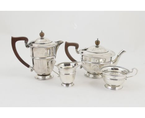 George V silver four piece tea service, by The Adie Bros. Sheffield 1933, comprising lidded teapot with composite finial and 