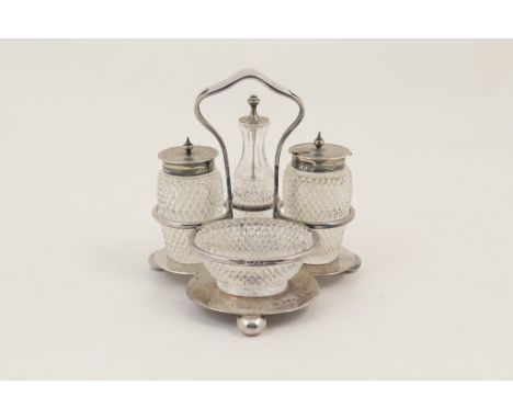 Late Victorian silver and cut glass cruet stand, by Walker & Hall, Sheffield 1893, shaped base centred with a carrying handle