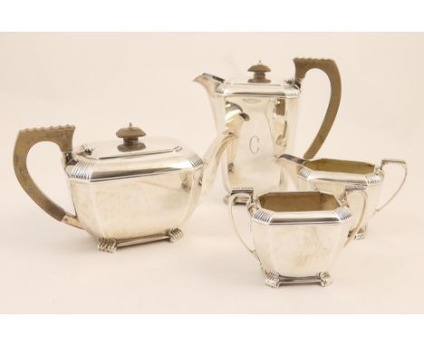 George VI silver four piece tea service in the Art Deco style, Sheffield 1941, comprising lidded teapot, hot water jug, sugar