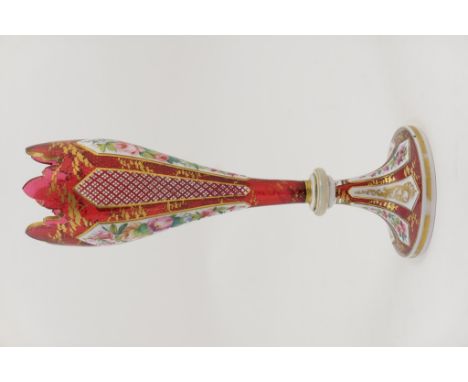 Bohemian ruby and white overlay glass vase, circa 1870, with crenellated top and decorated with alternate panels of vertiline