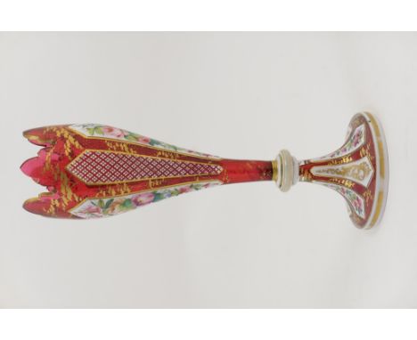 Bohemian ruby and white overlay glass vase, circa 1870, with crenellated top and decorated with alternate panels of vertiline