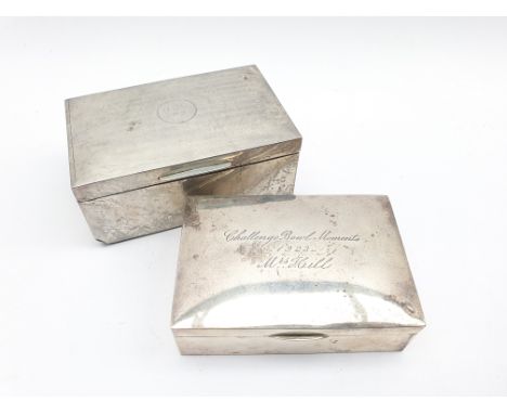 Engine turned silver cigarette box with initials and dated 1949 W14cm London 1922 and another with presentation inscription W