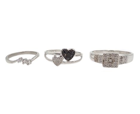 White gold heart design black and white diamond ring, and two diamond set rings, all 9ct hallmarked or tested (3) - Condition