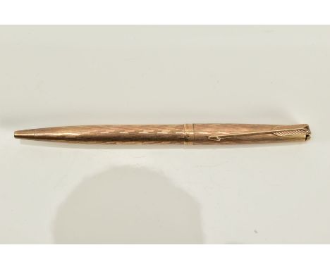 A 9CT GOLD BALL POINT PARKER PEN, of engine turn design, hallmarked 9ct gold London, approximate weight of case 13.0 grams&nb
