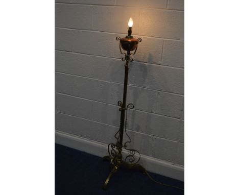 AN NEARLY TWENTIETH CENTURY ART NOUVEAU BRASS TELESCOPIC STANDARD LAMP, with a brass reservoir, maximum height to fitting 168