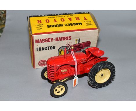 A BOXED LESNEY MASSEY-HARRIS 745D TRACTOR, red body, cream wheel hubs, black rubber tyres, appears complete with exhaust, air