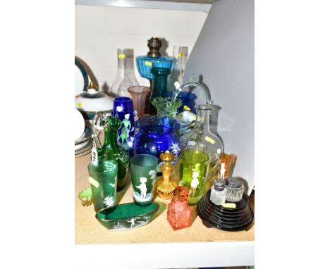 A MISCELLANEOUS GROUP OF GLASSWARE, to include Mary Gregory tumblers, vases, pitcher, etc, an oil lamp with blue glass reserv