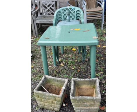 A GREEN PLASTIC GARDEN TABLE, 78cm x 78cm x 76cm high, four similar stacking chairs, a parasol base and a pair of composite p