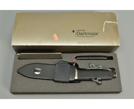 A WILKINSON SWORD CSK 185 DARTMOOR SURVIVAL KNIFE in its original packaging complete with sheath, these knives were originall