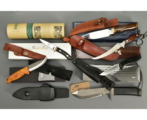 A COLLECTION OF BOXED KNIVES with exception of the last item consisting of Smith &amp; Wesson sheath knife serial number 1512