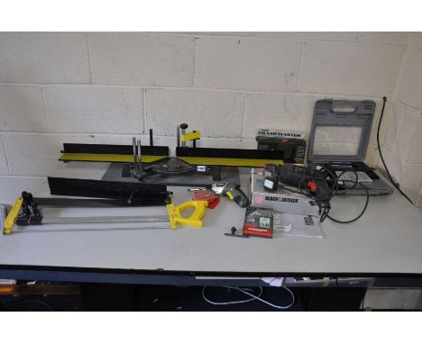 A BLACK AND DECKER HAMMER DRILL, a Woolworths electric stapler (both PAT and working), a Fletcher Framemaster, mite saw, an X