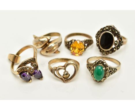 A SELECTION OF SIX RINGS, to include an onyx and marcasite cluster ring, Sheffield import mark, ring size P, an openwork hear
